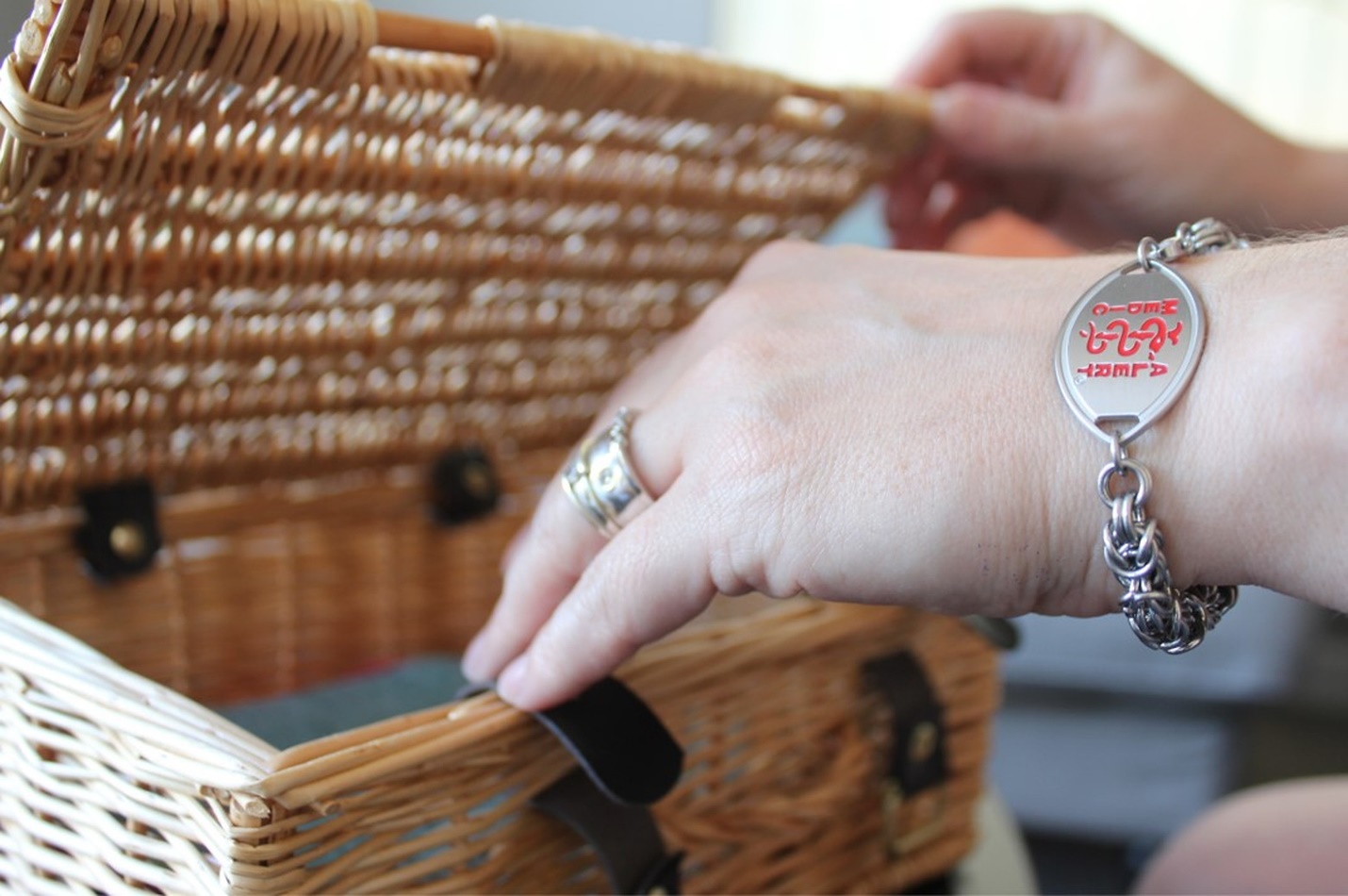 person opening basket with hands